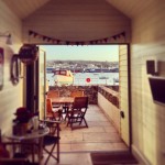 Looking out to sea from inside Shaldon Beach Hut number 1