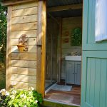 The bathroom hut at Sika shepherd's hut at Warmwell House in Dorset.