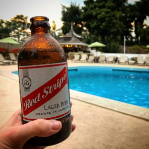 Having a Red Stripe beer while the sunsets in Kingston, Jamaica.