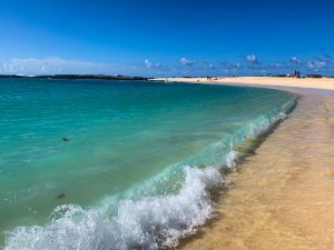 Waves rolling onto the shore at La Concha Beach, El Cotillo, Fuerteventura