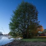 Camping by the lake at New Forest Water Park with a campfire